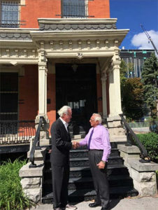 Tom Garvey and Russell Salvatore seen in front of 766 Ellicott Street, to be named for Russell J. Salvatore 