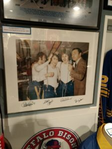 An autographed picture of the French Connection and Van Miller from when the Sabres clinched their first playoff appearance after defeating the St. Louis Blues in 1973