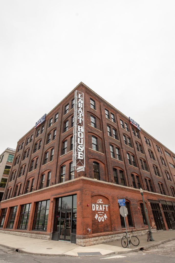 Photo of the exterior of the 5-story historic brick building