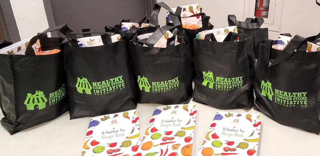 Photo of bags filled with healthy foods, and recipe books