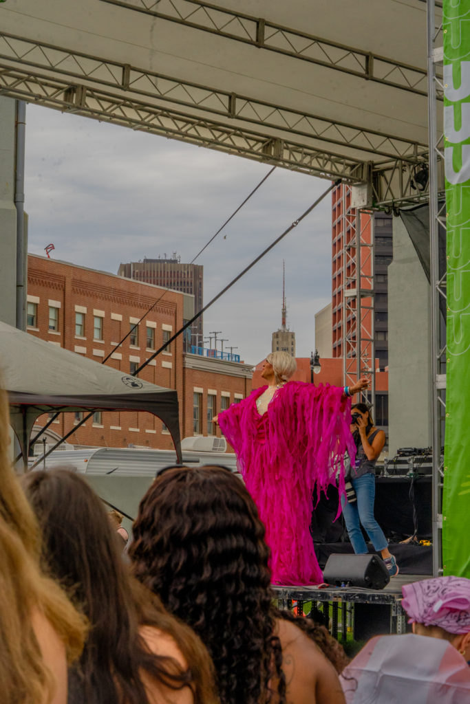 Drag queens perform at the stage set up at the outer harbor
