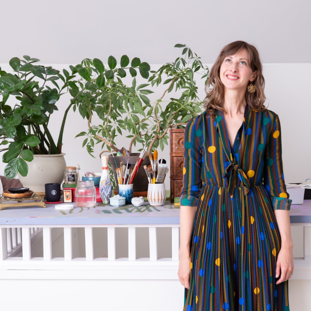 Cassandra Ott poses in her studio