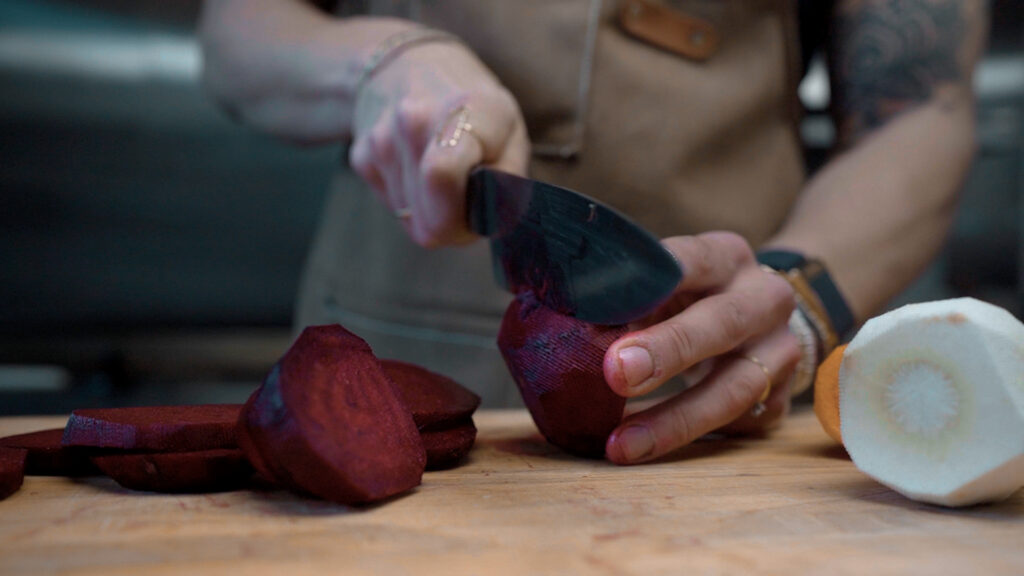 Shana Maldonado slices up some beets as she walks us through a recipe