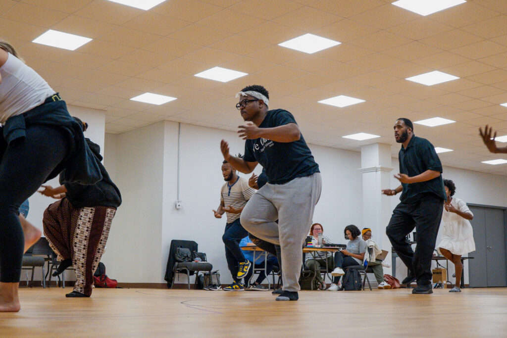 The cast of The Color Purple learns choreography